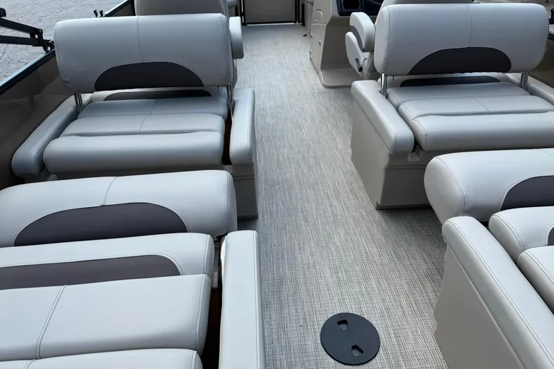 Slide: The Image of 2025 Bentley Pontoons Legacy 223 QSB interior with luxurious seating and modern design. - 16
