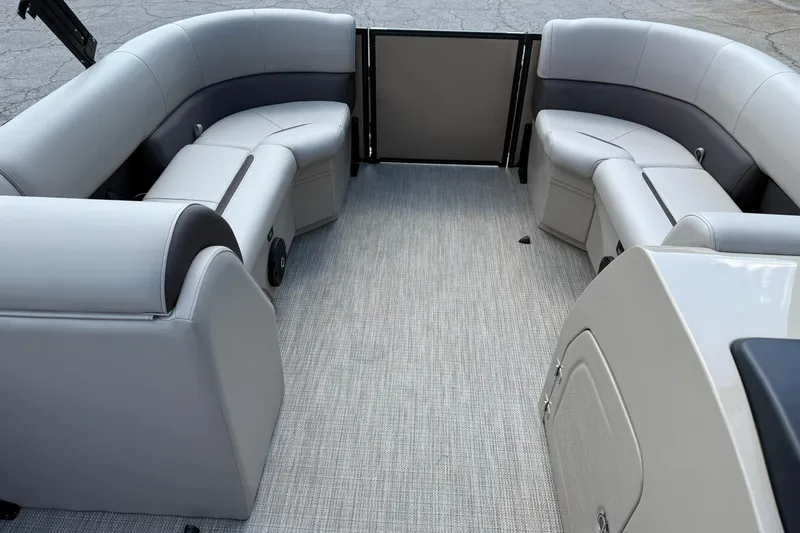 Slide: The Image of 2025 Bentley Pontoons Legacy 223 QSB interior with luxurious seating and modern design. - 7