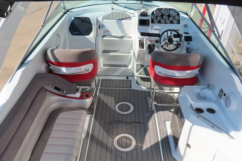 Slide: The Image of 2008 Baja 335 Performance boat interior with modern dashboard and seating. - 12