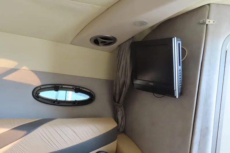 Slide: The Image of Interior of 2008 Baja 335 Performance boat with TV and porthole window. - 18