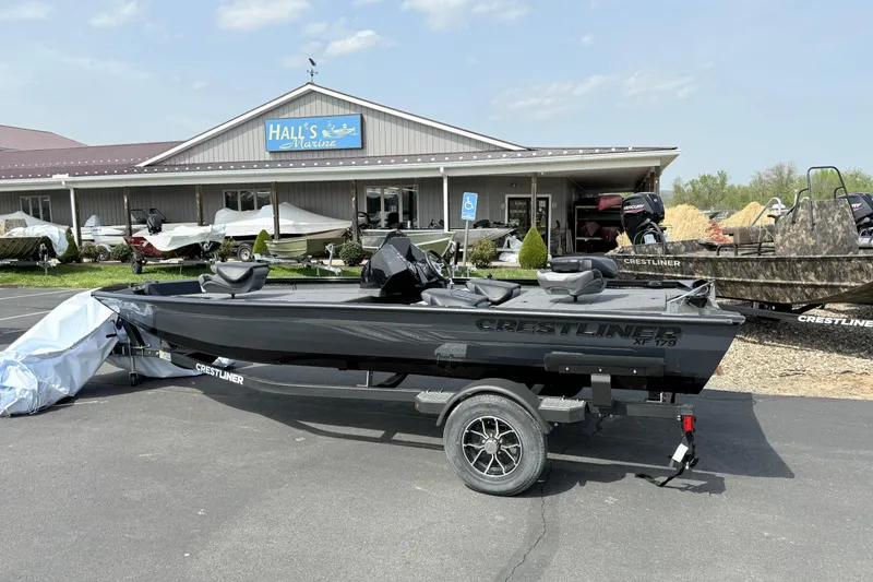 The Image of 2025 Crestliner XF 179 boat on trailer at Hall's Marine dealership. - 0