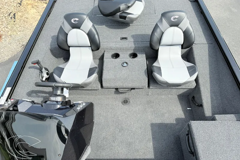 Slide: The Image of 2025 Crestliner XF 179 boat interior with dual seats and steering console. - 6