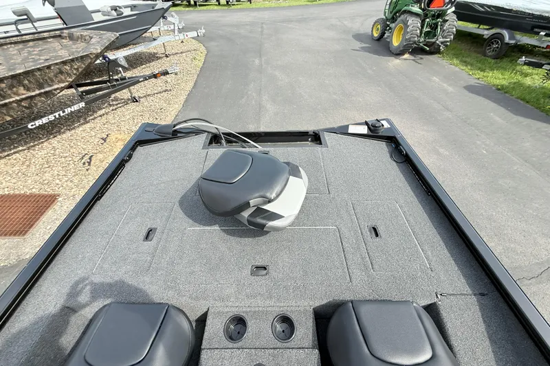 Slide: The Image of 2025 Crestliner XF 179 boat interior with seating and storage compartments. - 8