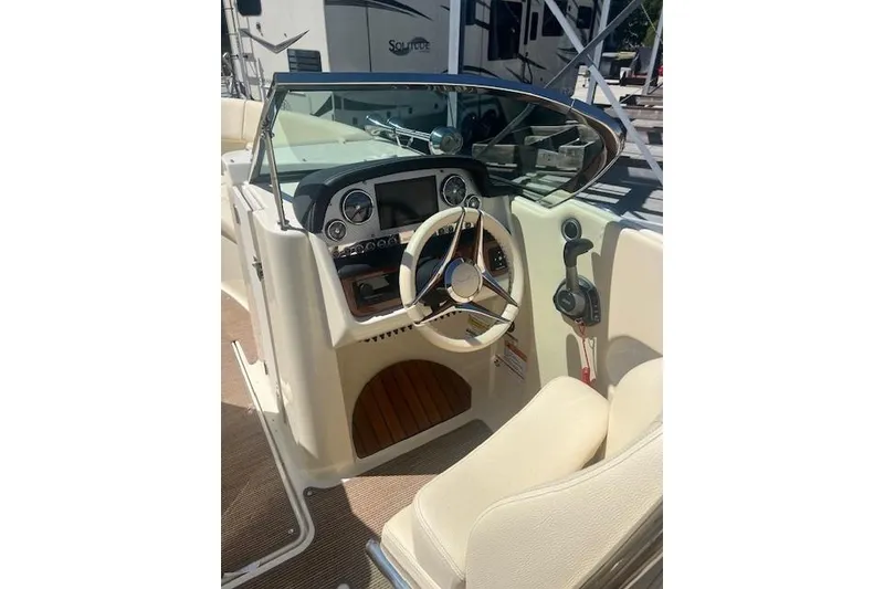 Slide: The Image of 2024 Chris-Craft Launch 27 boat underside, showcasing hull and propeller details. - 4