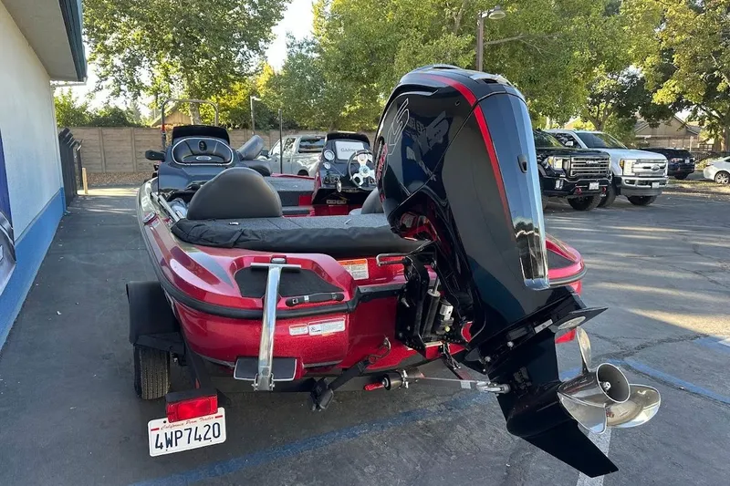 Slide: The Image of 2024 Nitro Z17 boat with powerful outboard motor in parking lot. - 10