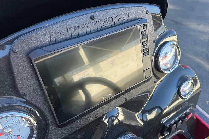 Slide: The Image of Dashboard of 2024 Nitro Z17 boat featuring Garmin display and gauges. - 15