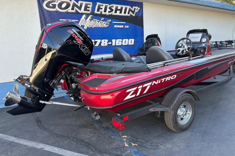 Slide: The Image of 2024 Nitro Z17 boat with Mercury Pro XS engine, parked at dealership. - 8