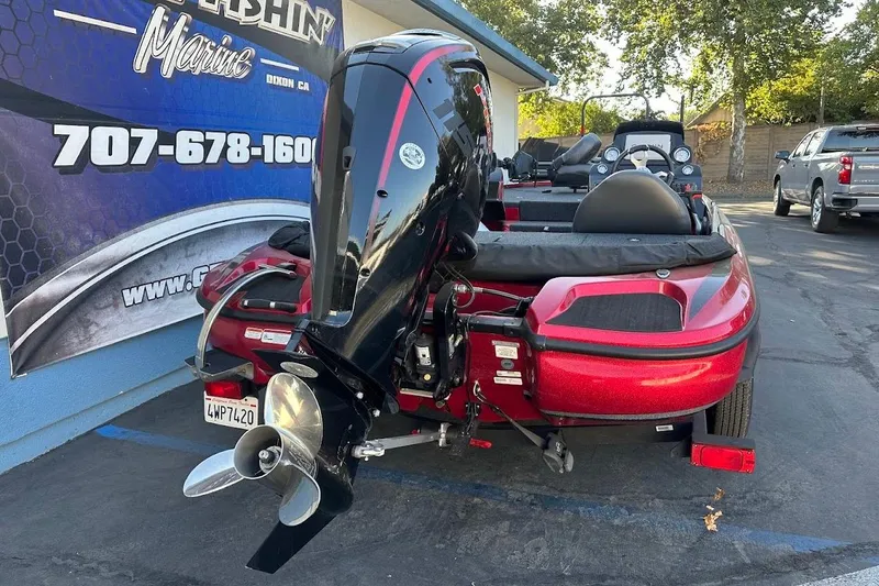 Slide: The Image of 2024 Nitro Z17 boat with powerful outboard motor, parked at dealership. - 9