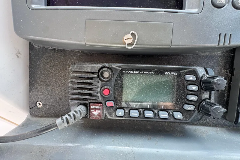 Slide: The Image of VHF radio on 1999 Tiara Yachts 2900 Open, featuring Standard Horizon Eclipse model. - 20