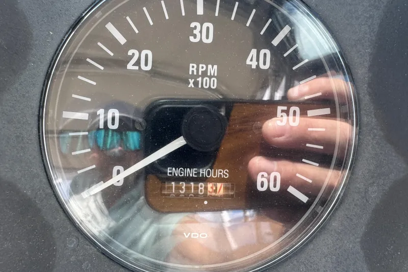 Slide: The Image of Close-up of Tiara Yachts 2900 Open 1999 tachometer showing 1318 engine hours. - 22