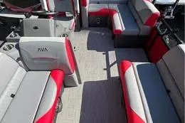 Slide: The Image of 2026 Avalon VENTURE CRUISE boat interior with red and gray seating. - 5
