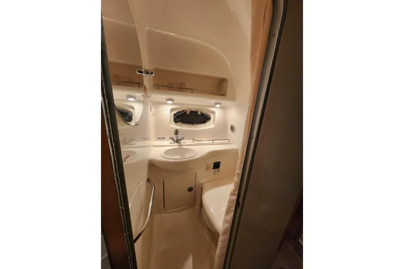 Slide: The Image of Engine compartment of a 2006 Chaparral Signature 290 boat, featuring a Volvo Penta engine. - 21