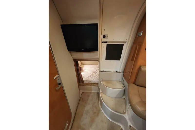 Slide: The Image of Engine compartment of 2006 Chaparral Signature 290 with visible wiring and components. - 22