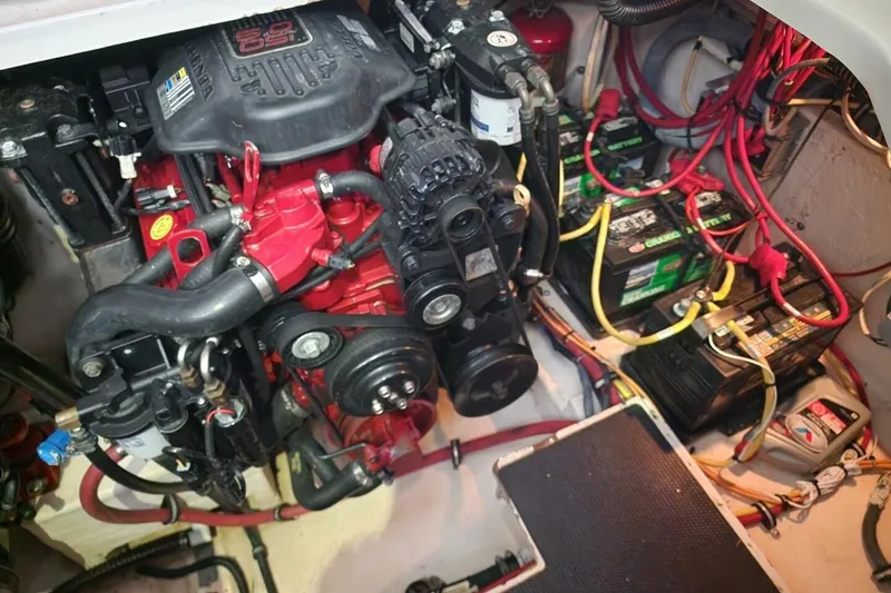 Slide: The Image of 2006 Chaparral Signature 290 boat stored indoors on a trailer. - 26