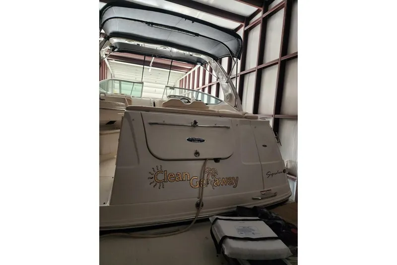 Slide: The Image of Engine compartment of a 2006 Chaparral Signature 290 boat, showing detailed wiring and components. - 6