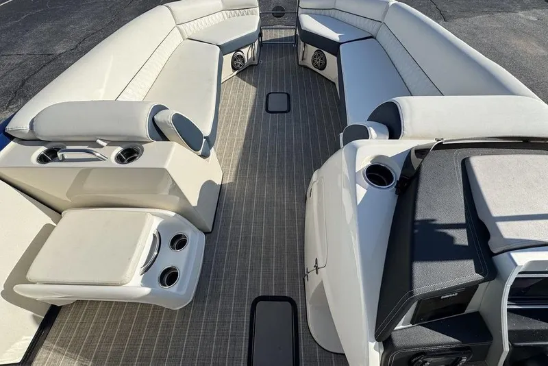 Slide: The Image of Luxurious interior of 2021 Harris Crowne SL 270 Twin Engine boat with plush seating. - 12