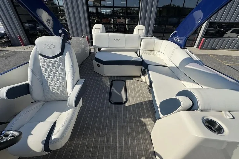 Slide: The Image of Luxurious interior of 2021 Harris Crowne SL 270 Twin Engine boat with plush seating. - 16