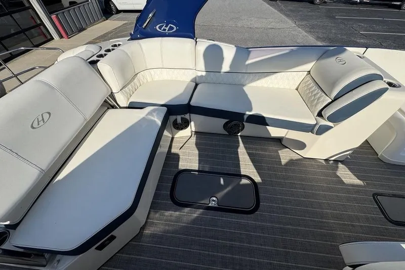 Slide: The Image of 2021 Harris Crowne SL 270 Twin Engine boat interior with luxurious seating and modern design. - 18