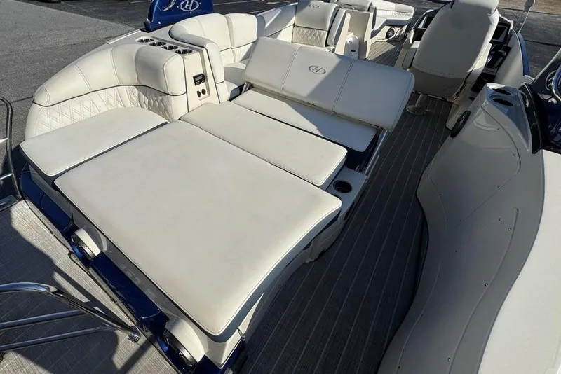 Slide: The Image of 2021 Harris Crowne SL 270 Twin Engine boat with luxurious seating and modern design. - 22