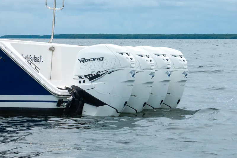Slide: The Image of 2016 SeaHunter 45 boat with four Mercury Racing 400 outboard engines on the water. - 13