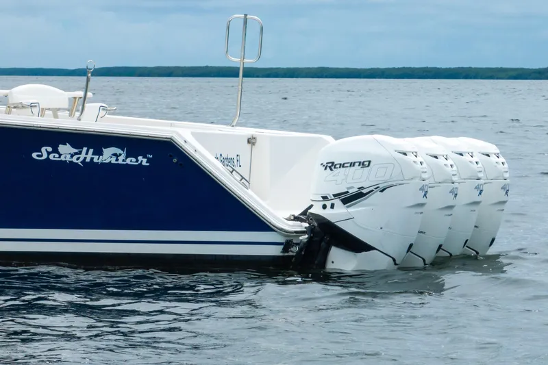 Slide: The Image of 2016 SeaHunter 45 boat with four powerful Racing 400 outboard engines on the water. - 14