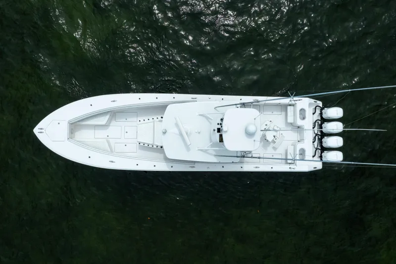 Slide: The Image of Overhead view of 2016 SeaHunter 45 boat on water, showcasing sleek design and powerful engines. - 9