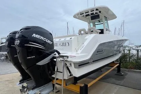 Slide: The Image of 2020 Boston Whaler 280 Outrage with twin Mercury engines on display. - 2
