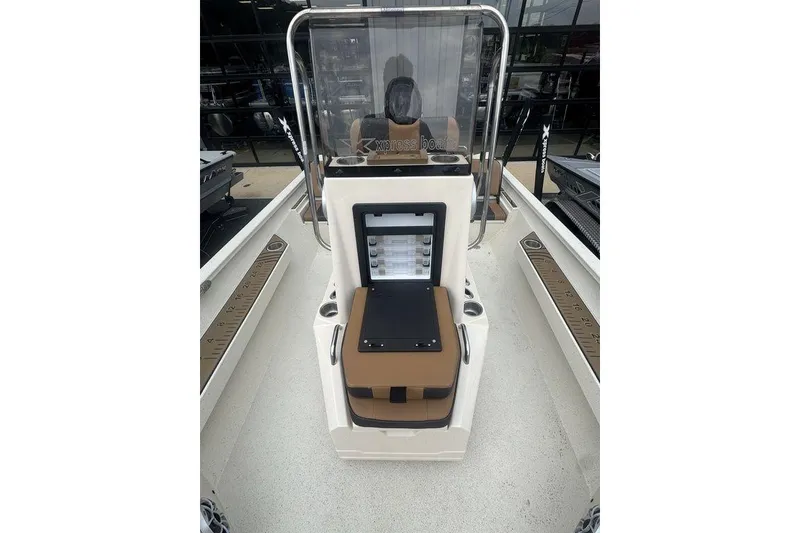 Slide: The Image of 2026 Xpress H22B Bay boat interior with seating and storage compartments. - 15