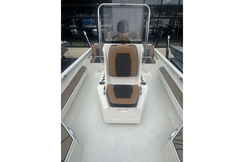 Slide: The Image of 2026 Xpress H22B Bay boat interior with dual seats and console. - 21