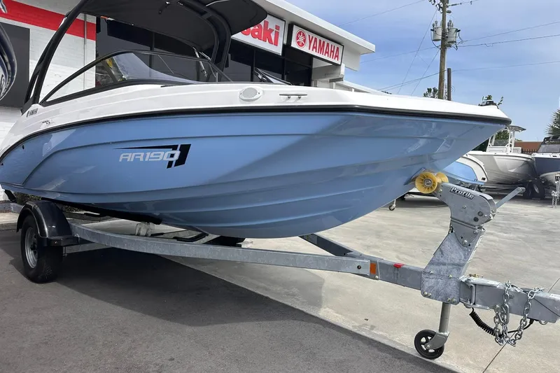 The Image of 2025 Yamaha Boats AR190 on trailer at dealership, showcasing sleek design and modern features. - 0