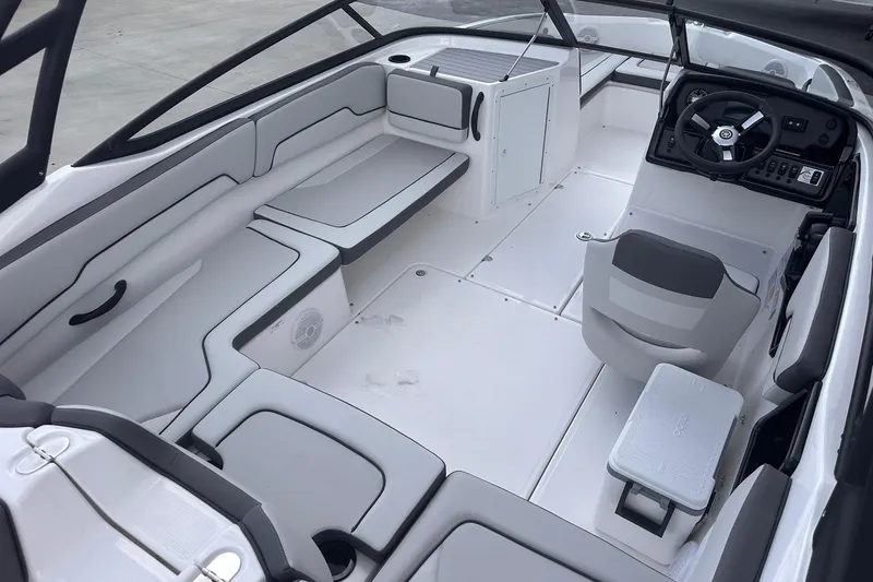Slide: The Image of 2025 Yamaha Boats AR190 interior with sleek seating and modern dashboard design. - 8