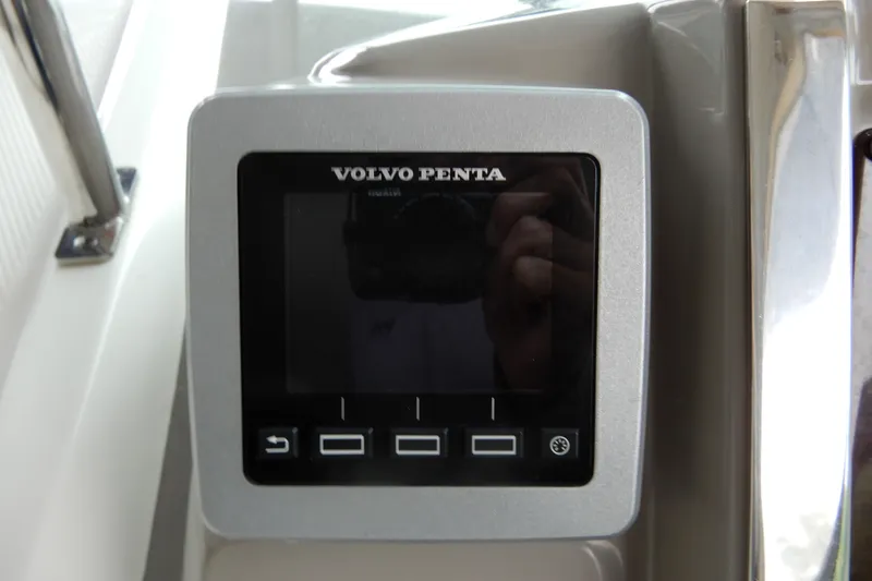 Slide: The Image of Volvo Penta control panel on 2016 Chaparral 310 Signature boat. - 27