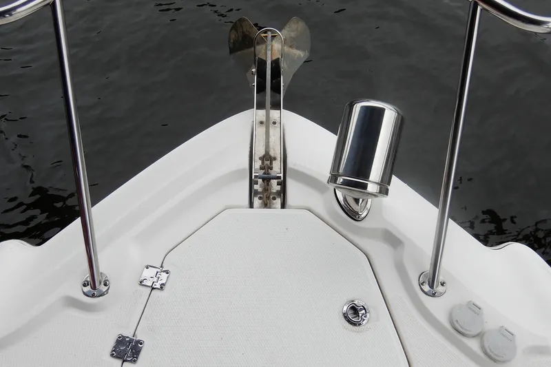 Slide: The Image of Bow of 2016 Chaparral 310 Signature boat with anchor and railing. - 6