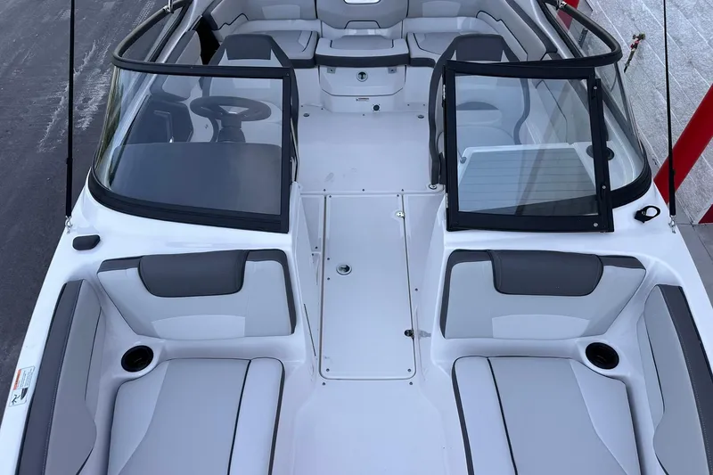 Slide: The Image of 2025 Yamaha Boats SX190 interior with sleek seating and modern design. - 14