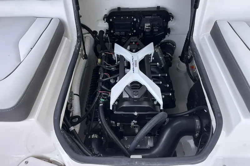 Slide: The Image of 2025 Yamaha Boats SX190 engine compartment, showcasing modern design and advanced technology. - 15