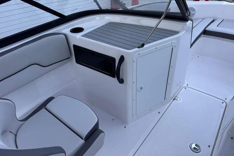 Slide: The Image of 2025 Yamaha Boats SX190 interior with seating, storage, and sleek design. - 7