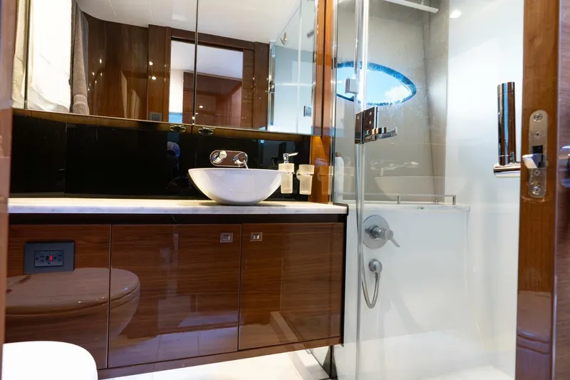 Slide: The Image of Luxurious bathroom in 2015 Princess 56 Flybridge Motor Yacht with modern fixtures and elegant design. - 18