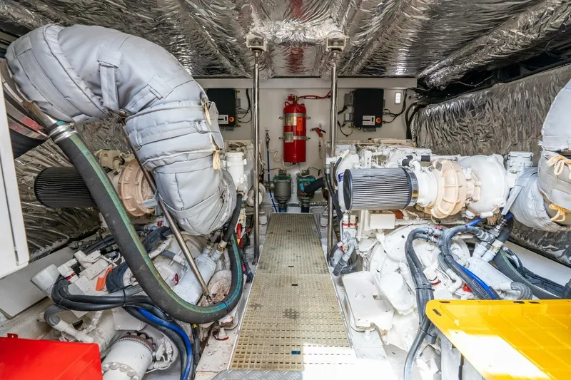 Slide: The Image of Engine room of 2015 Princess 56 Flybridge Motor Yacht, featuring advanced machinery and equipment. - 44