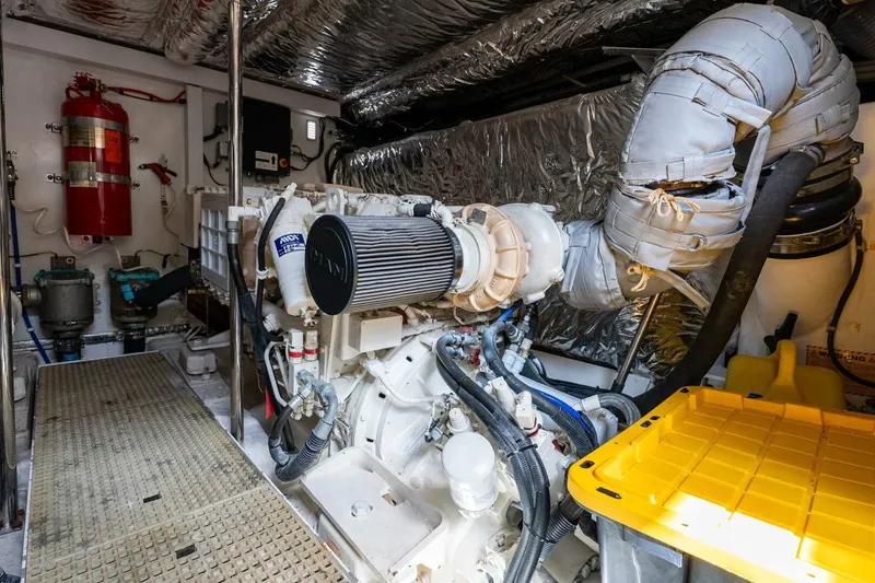 Slide: The Image of Engine room of 2015 Princess 56 Flybridge Motor Yacht, featuring advanced machinery and equipment. - 46