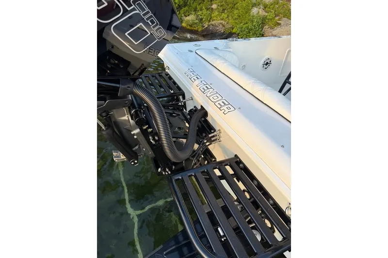 Slide: The Image of Rear view of Concept 27 boat, 2004 model, featuring engine and deck details. - 11