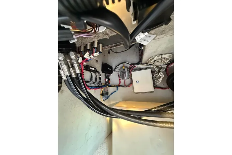 Slide: The Image of Electrical wiring and components inside a 2004 Concept 27 boat. - 9
