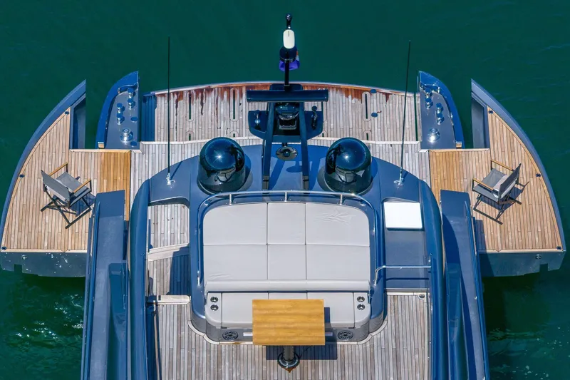 Slide: The Image of Aerial view of 2025 Pershing GTX 80 yacht with spacious deck and seating. - 12