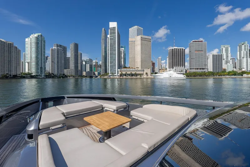 Slide: The Image of Luxury Pershing GTX 80 yacht with city skyline backdrop, 2025 model. - 18