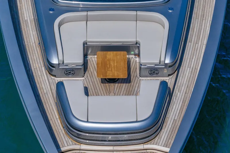 Slide: The Image of Aerial view of 2025 Pershing GTX 80 yacht's elegant deck seating area. - 19