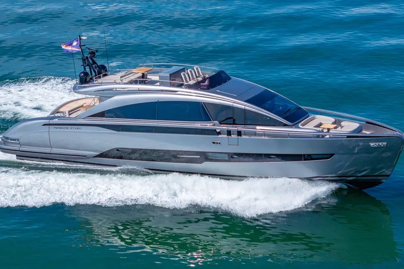 Slide: The Image of 2025 Pershing GTX 80 yacht cruising on blue ocean waters. - 2