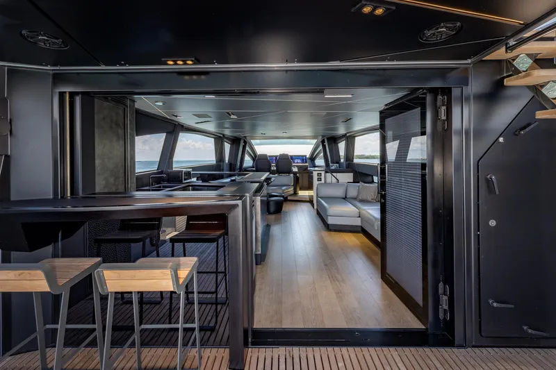 Slide: The Image of Luxurious interior of 2025 Pershing GTX 80 yacht with modern seating and sleek design. - 25