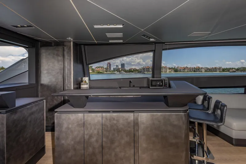 Slide: The Image of Luxurious interior of 2025 Pershing GTX 80 yacht with modern design and waterfront view. - 26