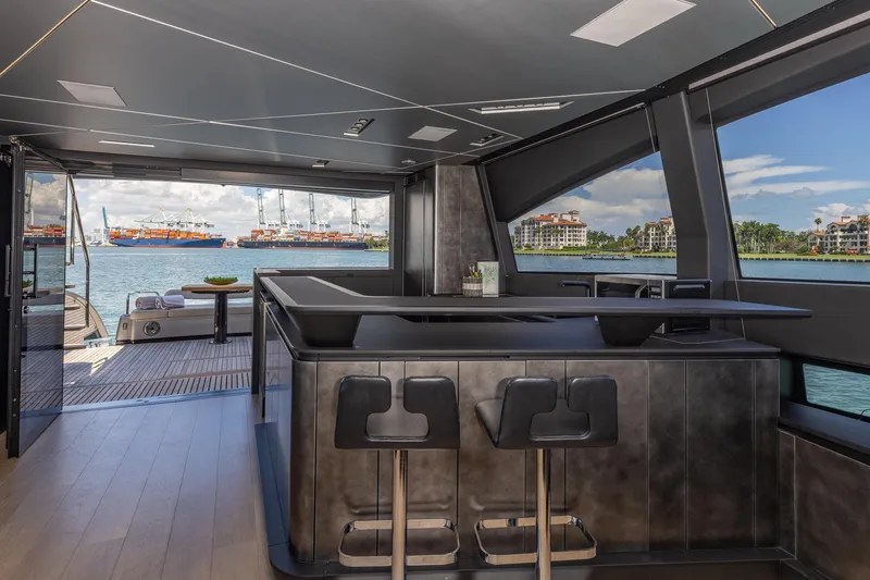 Slide: The Image of Luxurious interior of 2025 Pershing GTX 80 yacht with waterfront view. - 27
