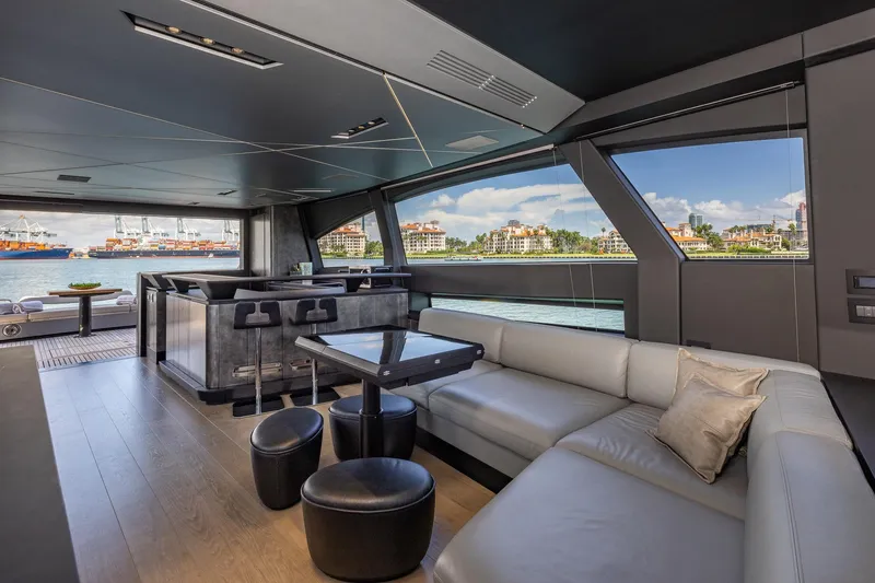 Slide: The Image of Luxurious interior of 2025 Pershing GTX 80 yacht with modern seating and waterfront view. - 31