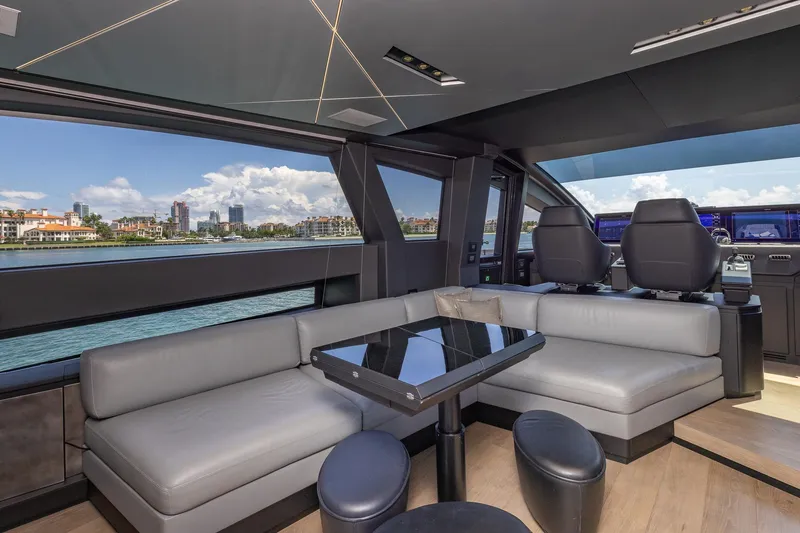 Slide: The Image of Luxurious interior of 2025 Pershing GTX 80 yacht with modern seating and scenic views. - 32